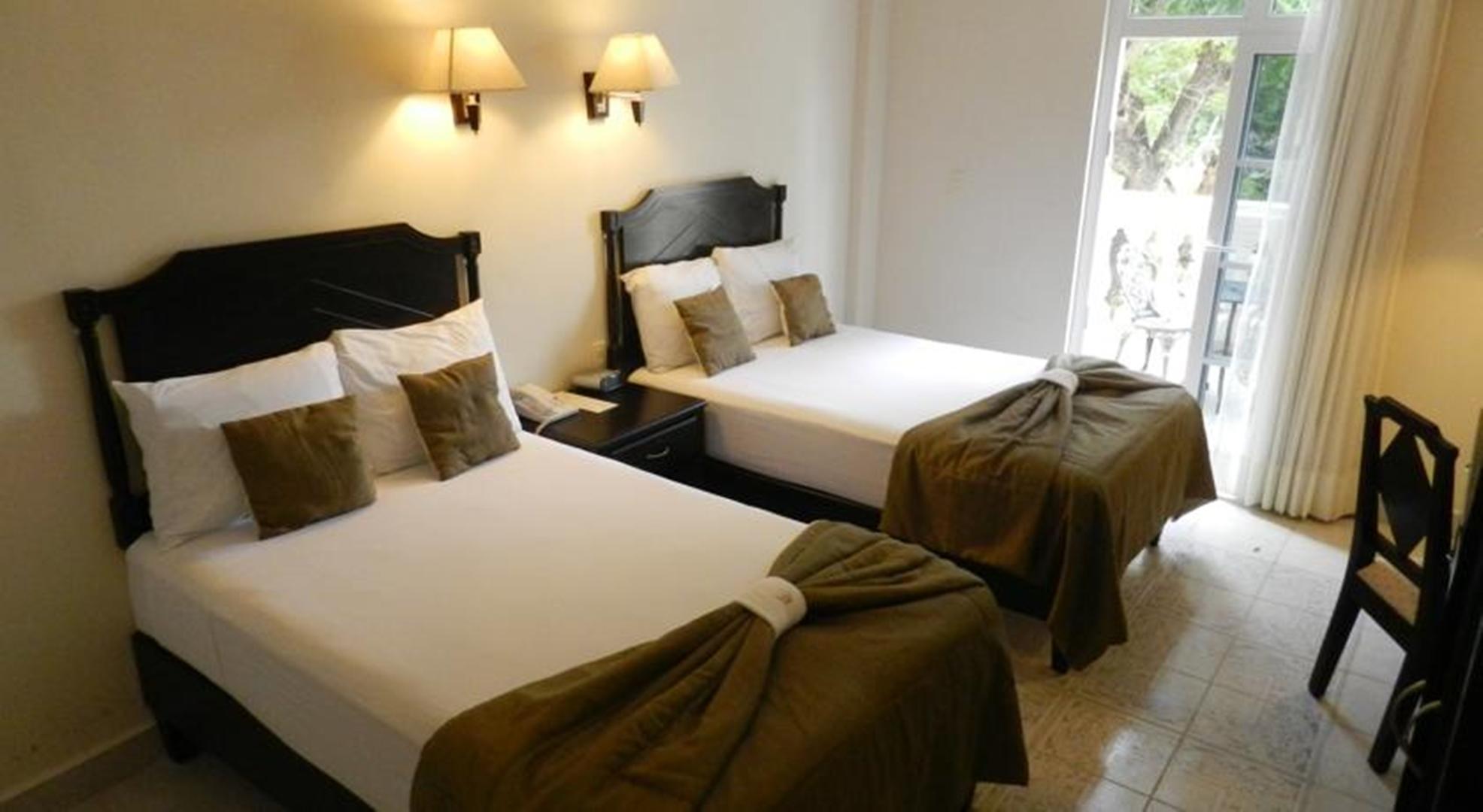 Hotel Victoria Mérida Exterior foto A room at the hotel