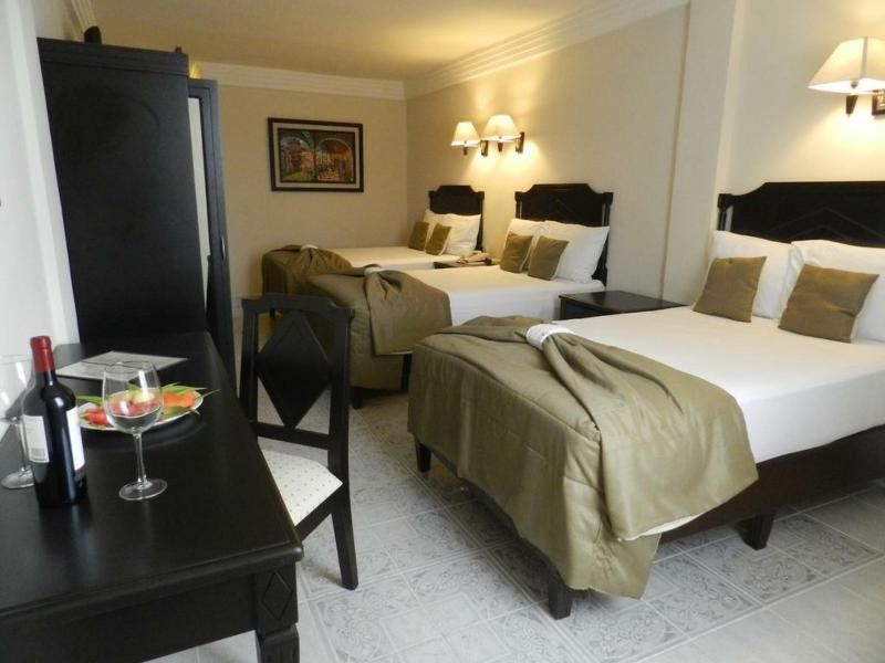 Hotel Victoria Mérida Exterior foto A room at the hotel