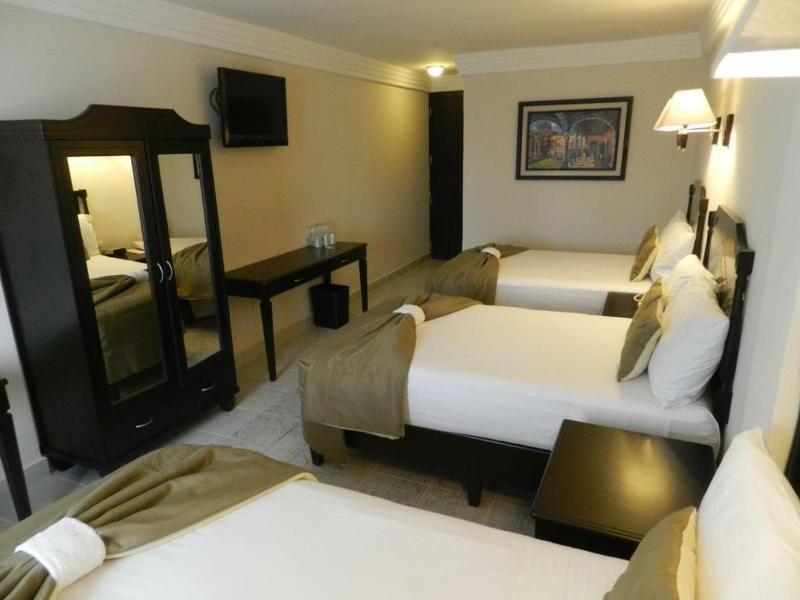 Hotel Victoria Mérida Exterior foto A room at the hotel